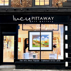 Exterior of the Lucy Pittaway Art Gallery in Yarm, showing the shopfront and framed artwork displayed in the window.