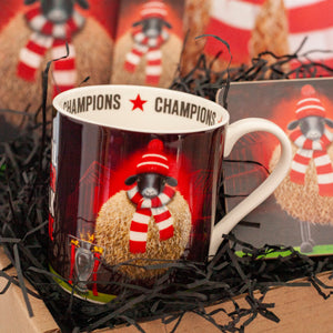 Liverpool FC Champions mug featuring a sheep illustration and decorative football-themed elements.